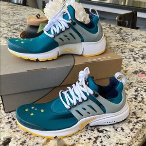 Nike #8Teal and Yellow Athletic Shoes